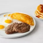 Two House-Made Sausage Patties & Eggs